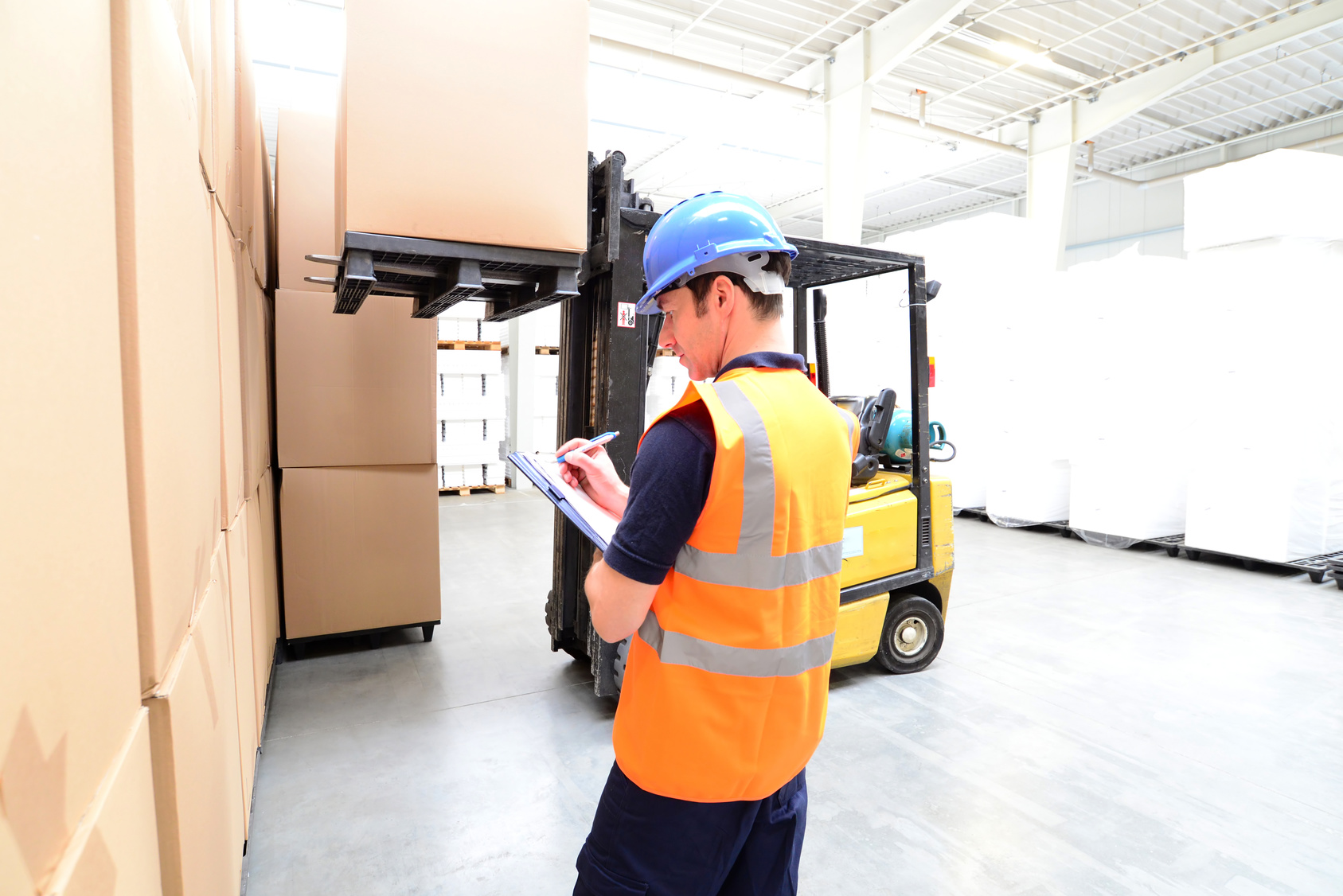 forklift operator training in background