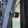 Tri View Camera shown facing directly behind the forklift operator on the left side of forklift. This camera shows the operator any activity happening directly behind the left side of the forklift. Using this camera and two additional cameras, positioned on the rear and right side of the forklift provides 170 degree view behind the forklift operator.
